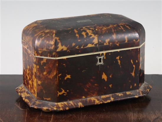 A Victorian tortoiseshell two division tea caddy, 9in.